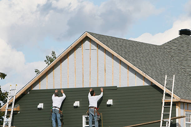 Professional Siding Contractor technician working in Columbia, MD